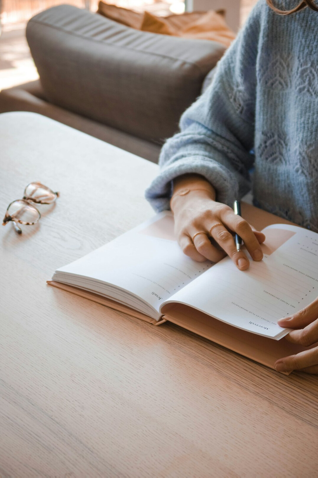 person reviewing budget planner