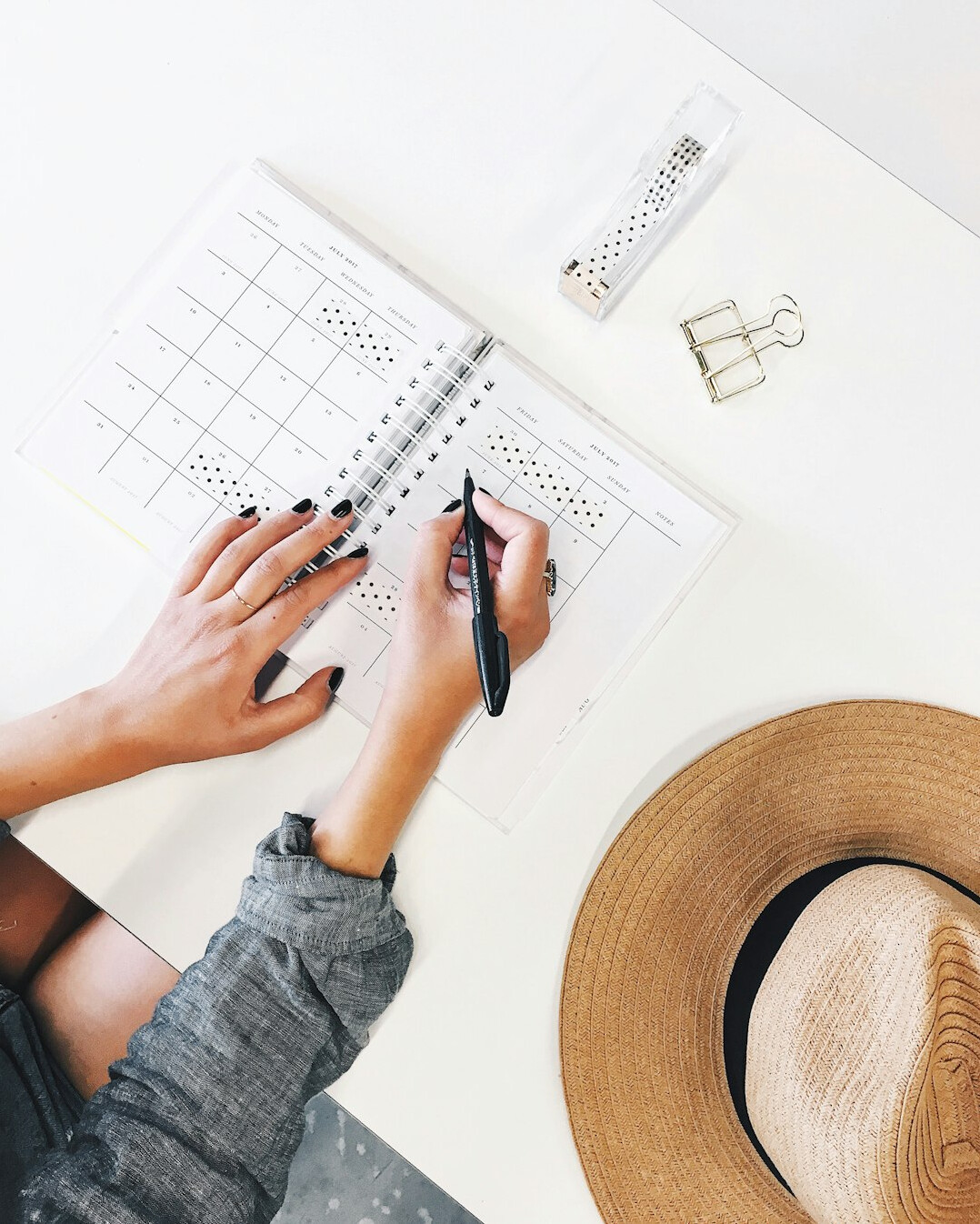 person reviewing budget planner