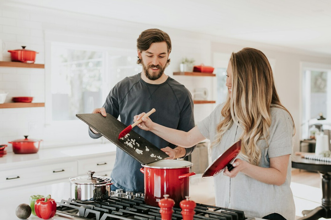 couple calculating household budget