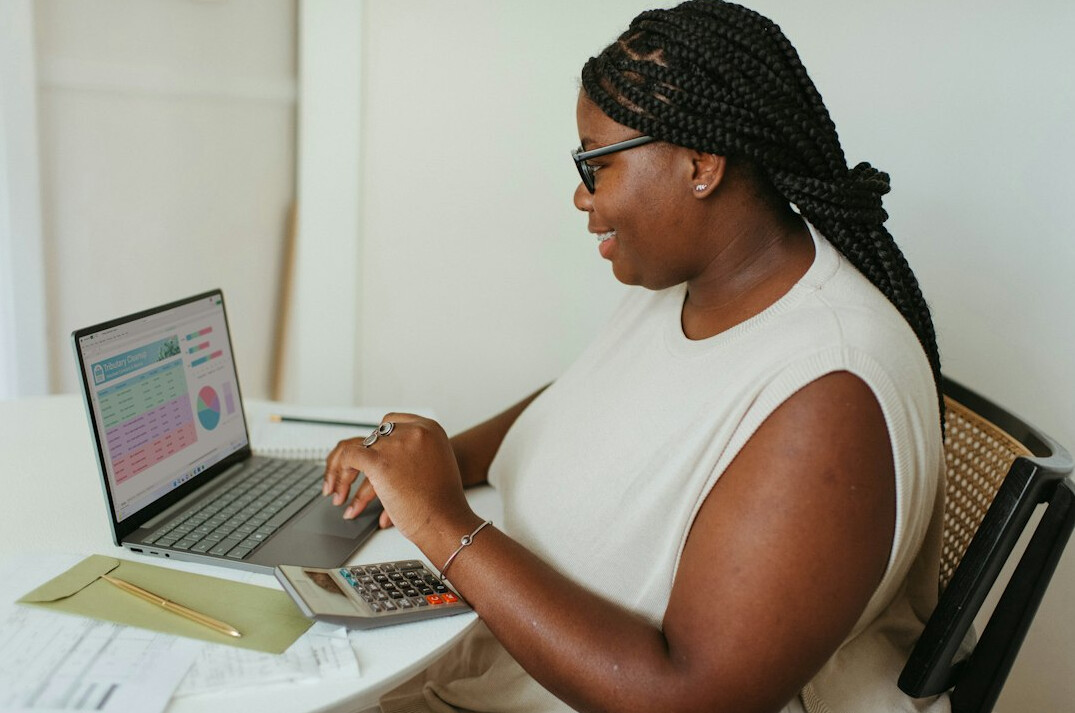 person reviewing budget spreadsheet